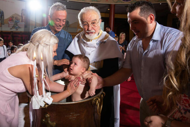 Tauffotograf, griechisch orthodoxe Taufe